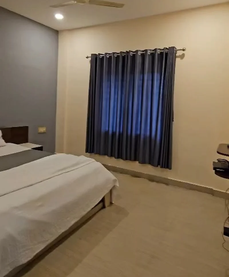 Clean and comfortable Non A/C room at Riva Vista Residence Kushalnagar